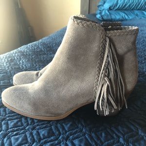 Tan fringe booties